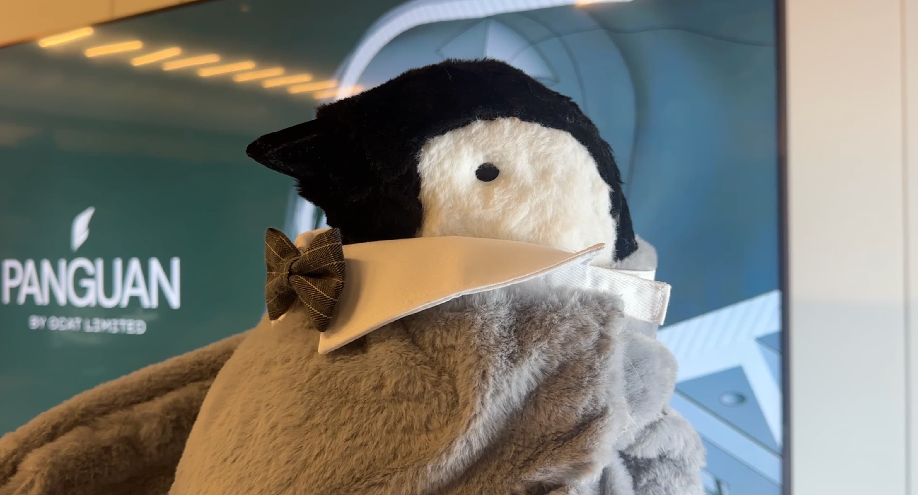 PANGUAN souvenir animatronic wearing a bow tie